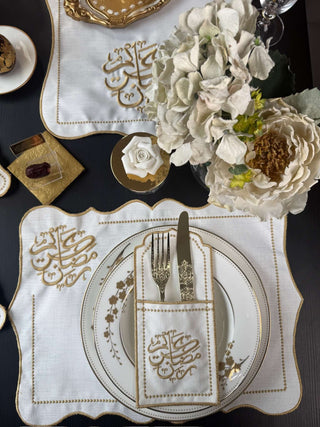 Ramadan Kareem Design Gold Placemat Set - Premium Fabric - 6 Persons - 19 Pieces on dining table with floral decor.