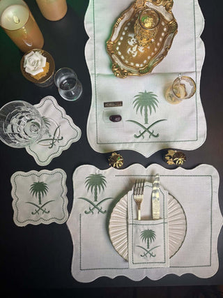Royal Palm & Swords Green Inspired Design Green Placemat Set - Premium Fabric - 6 Persons - 19 Pieces laid out on a dining table.