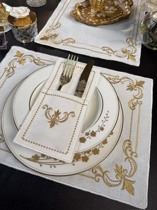 Classic Floral Gold Design Placemat Set - Premium Fabric - 6 Persons - 19 Pieces displayed on a dining table with cutlery.