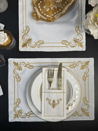 Classic Floral Gold Design Placemat Set - Premium Fabric - 6 Persons - 19 Pieces arranged on a dining table.